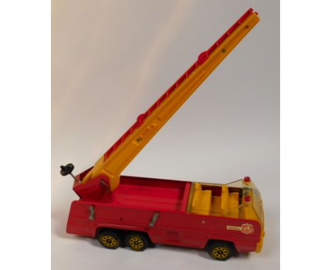 A Tonka tinplate fire engine, with working ladder.