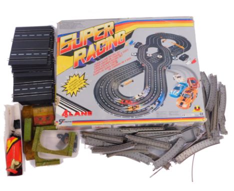 A Super Racing slot car set, various Scalextric track, railway track, Hornby series tinplate buildings, etc. (a quantity) 