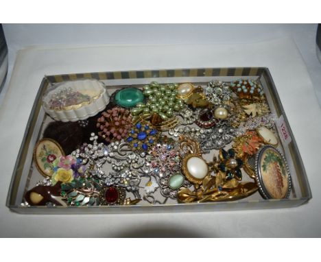 A large selection of vintage and later costume brooches including diamante, embroidered, ceramic etc