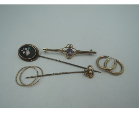 A small selection of yellow metal jewellery including stick pin stamped 9ct &amp; bar brooch stamped 15ct, 2 pairs of hoop ea