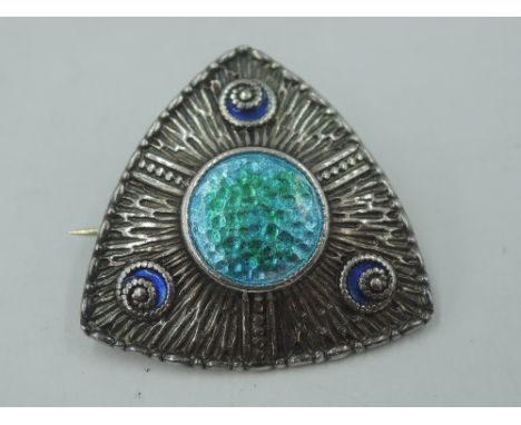 A silver and enamel brooch of triangular form having blue, green and turquoise decoration to textured base, Chester 1823, Cha