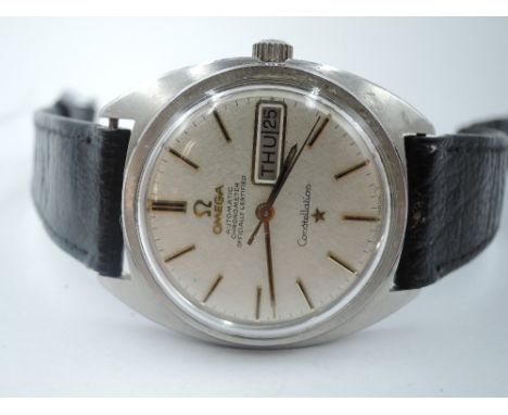 A gent's Omega constellation automatic chronometer wrist watch having baton numeral dial with day and date aperture in steel 