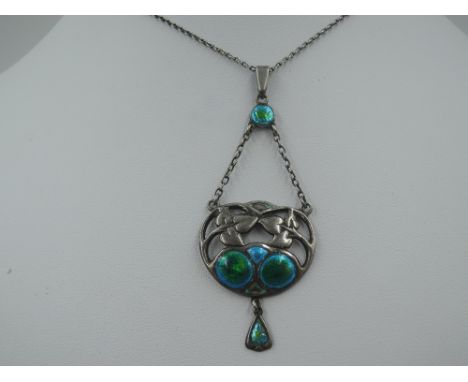 An Art Nouveau silver and enamel pendant by Charles Horner in shades of green and turquoise with enamel drop and chain fixer 