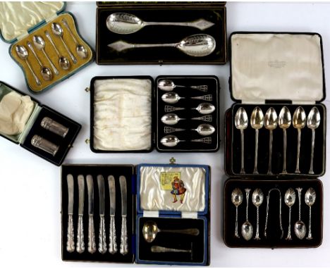 Group of cased silver and silver plated flatware sets including a set of six silver grapefruit spoons (8 cases)         