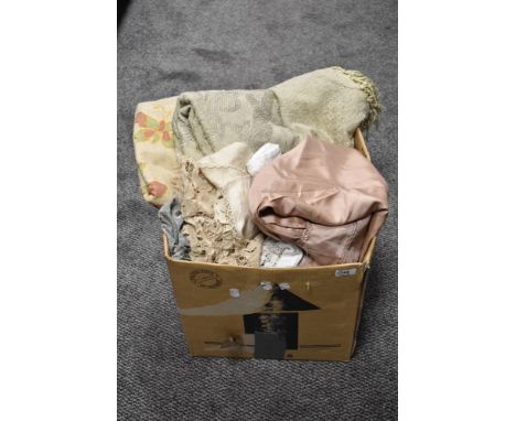 A large box of mixed vintage and retro table linen and similar.