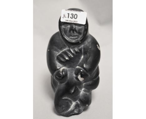 A Vintage Inuit Carved Stone Figure of a Hunter With Fish Eskimo 16cm High