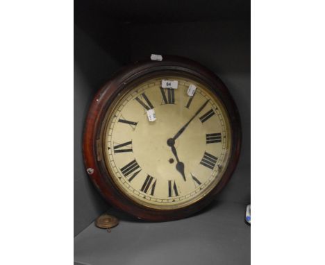 A Victorian mahogany cased station style wall clock, having Roman hours to the chapter ring enclosing the single winding aper