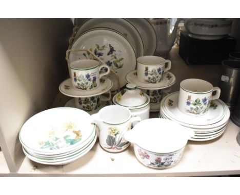 A vintage Wedgwood Florabunda pattern part dinner service with similar cups and saucers.