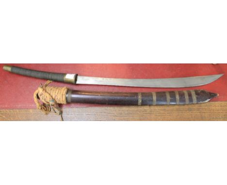 Burmese sword Dha having cord bound grip, steel single edged swell blade within a brass bound wooden scabbard with rope suspe