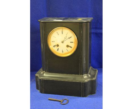 Late 19th century black slate, two train, flat topped mantle clock with French brass drum movement, striking on one bell.