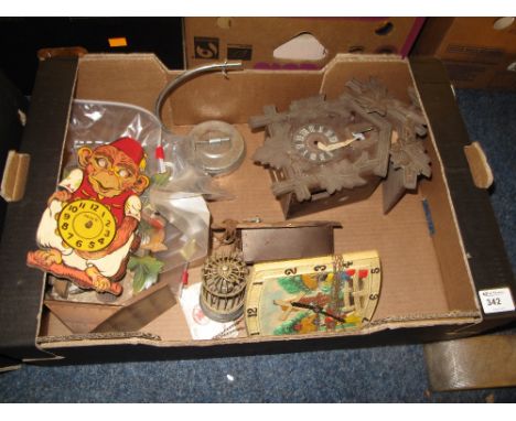 Box of assorted clock and clock parts to include cuckoo clocks, Paico advertising monkey clock, bird cage timer, Dutch wall c