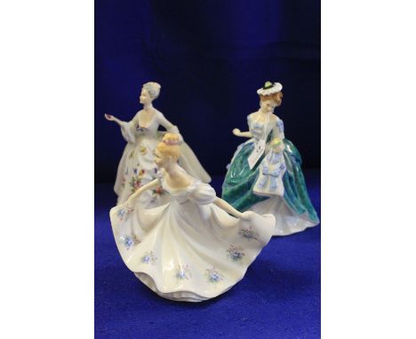 Three Royal Doulton bone china figurines, 'Cathy' HN3305, 'Linda' HN3374 and 'Diana' HN2468. (3)