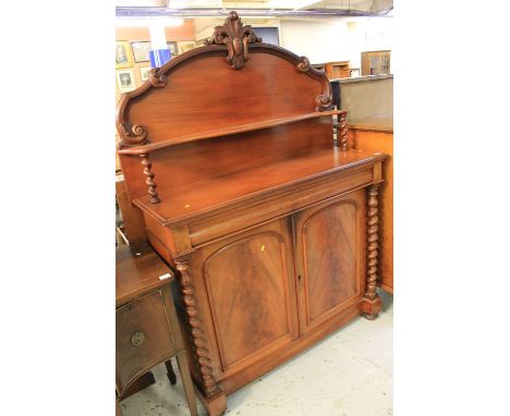 Victorian mahogany chifoneer having foliate arched raised back with shelf, the base with blind frieze drawer above two arched