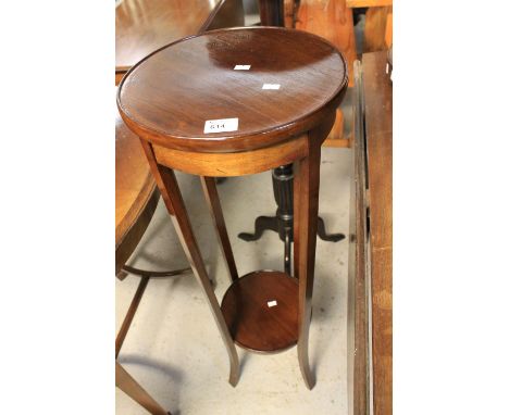 Edwardian mahogany circular jardiniere stand with under shelf. 