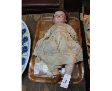 Early 20th Century German bisque headed Hoppelsdorf doll with natural hair, painted features and rolling eyes on a compositio