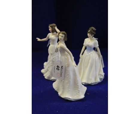 Three Royal Doulton Collector Club 'Sentiments' bone china figurines, 'Cherish' HN4442, 'Melody' HN4117 and 'Charmed' HN4445.