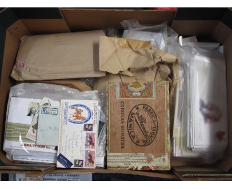 World selection of stamps on pages in envelopes, packets, cigar box and various First Day Covers.