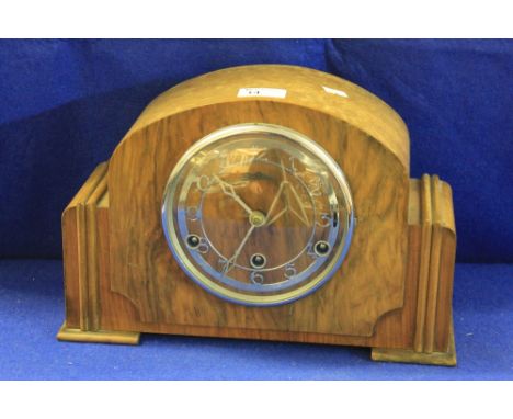 Mid 20th century Bentima simulated walnut three train arch top mantle clock. 