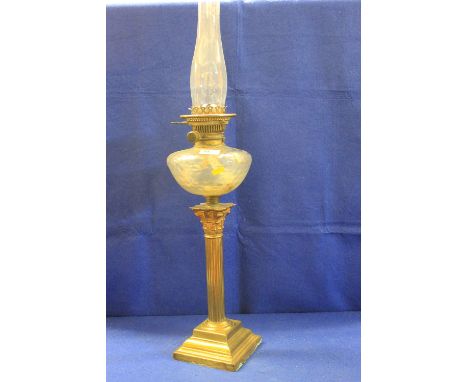Late 19th century brass double burned oil lamp with moulded glass reservoir on brass Corinthian column pedestal with stepped 