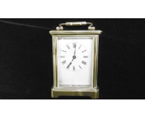 A BRASS CARRIAGE CLOCK