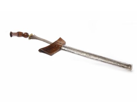 EARLY 20TH CENTURY MALAYAN DAGGERwith silvered metal scabbard, the blade 34cm long, 47cm long overall 