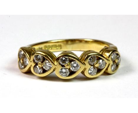 An 18ct yellow gold diamond set heart ring (approx 0.75ct diamonds total) (K).