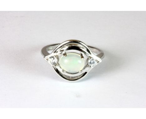 A 925 silver ring set with an opal and cubic zirconias.