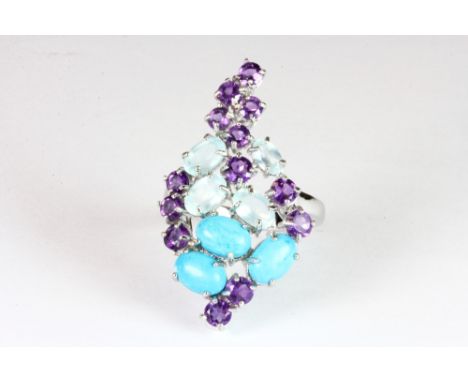 A 925 silver ring set with turquoise, amethyst and topaz.