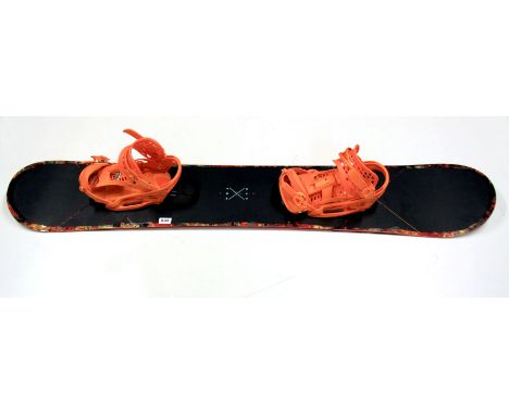 A Burton Custom snow board and straps. Please note this is a credit card reclaim item sold as seen and without reserve.