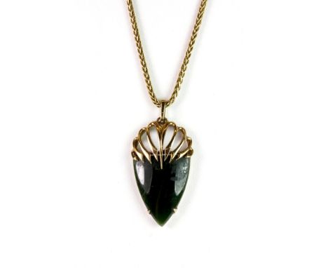 A 9ct gold mounted dark green jade pendant and heavy 9ct gold chain, chain 60 cms, approx. 18.4g.