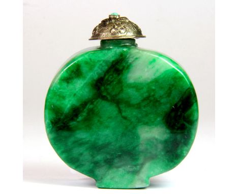 A Chinese carved jade Chinese snuff bottle, H. 6.5cm.