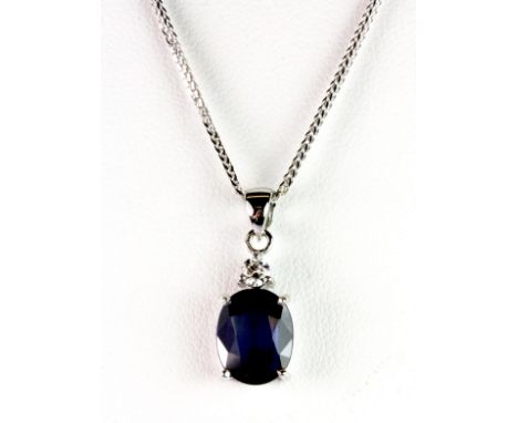 An 18ct white gold sapphire and diamond pendant on an 18ct white gold chain. Please note this lot is a credit card reclaim it