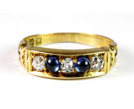 An antique hallmarked 18ct gold ring set with two sapphires and three diamonds. M.5. Approx 3.5 grams