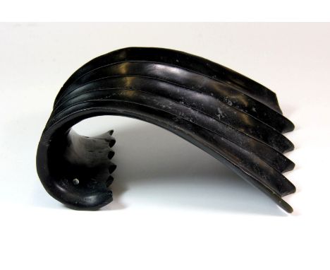A 19th/early 20th century Chinese carved jade temple gong in the shape of a wave, H. 18cm.
