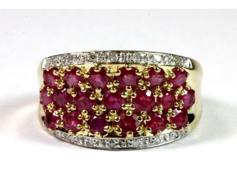 A 9ct gold ruby and diamond cluster ring, (stamped 375). (P)