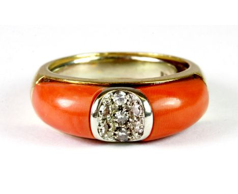 A lovely 1950's yellow metal ring (tested high carat gold) by Fred of Paris set with polished pink coral and diamonds. M.5. A