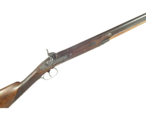 Percussion sporting gun, 30 inch 16 bore Damascus barrel, scroll engraved action and patch box, with chequered stock.Section 