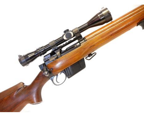L39A1 7.62 Lee Enfield rifle, 27.5inch heavy barrel, bolt head marked 00, fitted with standard 10 round 7.62 magazine, and ci