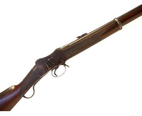 Martini Henry 577/450 short rifle, 25inch barrel with folding ladder sight stamped Henry Rifling, the action fitted with 'Bak