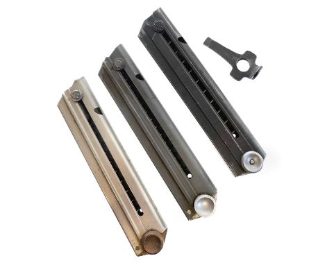 Three Luger magazines, one with wood base, the other two with metal bases, numbered 4115a, 3468, and a reloading / stripping 