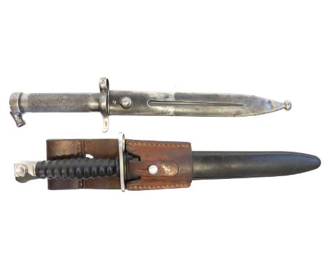 Two bayonets and scabbards, to include:Swiss M1957 SIG Export made for the 1957 Assault Rifle export market, most being sent 