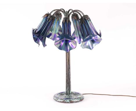 A 'Tiffany Studios New York' seven-lamp glass 'Lily' table lamp, the purple opalescent shades formed as partially-opened flow