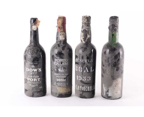 A bottle of 1953 Reserva Boal Madeira, together with a 1977 Dow's Silver Jubilee Vintage Port, a Porto Calem Quinta da Foz Vi