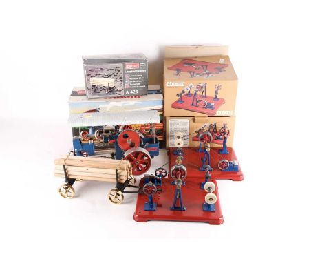 A boxed Wilesco Dampftraktor live steam traction engine (D40) together with a boxed Wilesco lumber wagon and two boxed Mamod 