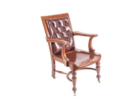 A late Victorian mahogany desk chair with moulded seat and leather upholstered back. 57 cm wide x 96 cm high overall. 45 cm h