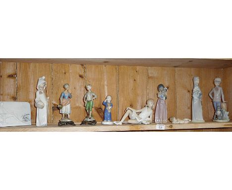 Shelf of Lladro and continental porcelain figures on metal bases (some A/F). Also including a Lladro bisque shop display plaq