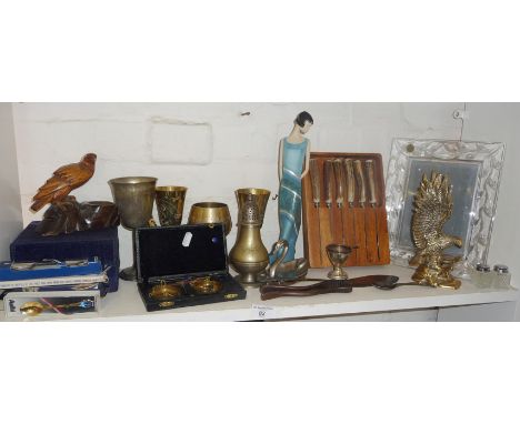 Miscellaneous items, inc. brass eagle, glass photo frame, sovereign scales, etc. (one shelf)