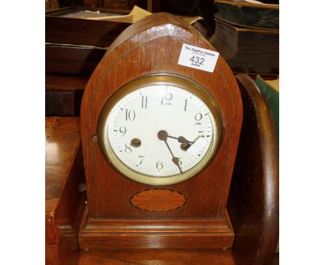 Edwardian inlaid mahogany arch topped mantle clock