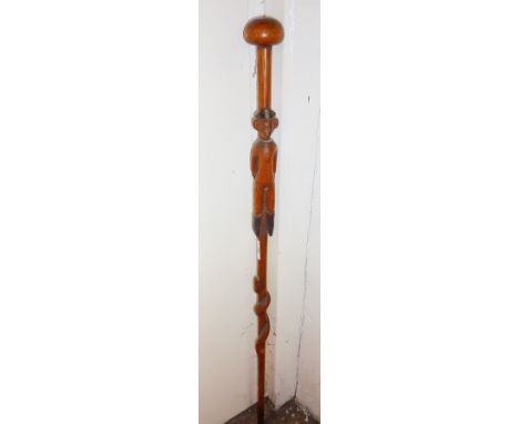 Tribal Art: Southeast African Staff, with a carved entwined serpent and colonial figure