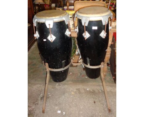 Two bongo drums on stand
